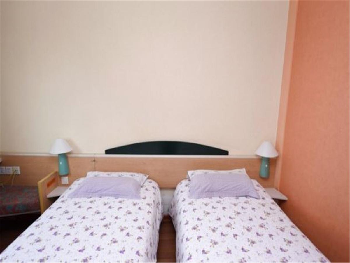 Motel Qingdao Jiaonan Renmin Road Business Street Exterior foto